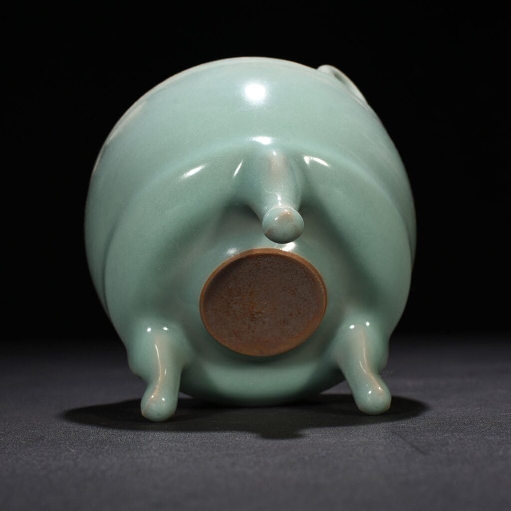Song Dynasty Longquan kiln pink green glaze bridge ear stove