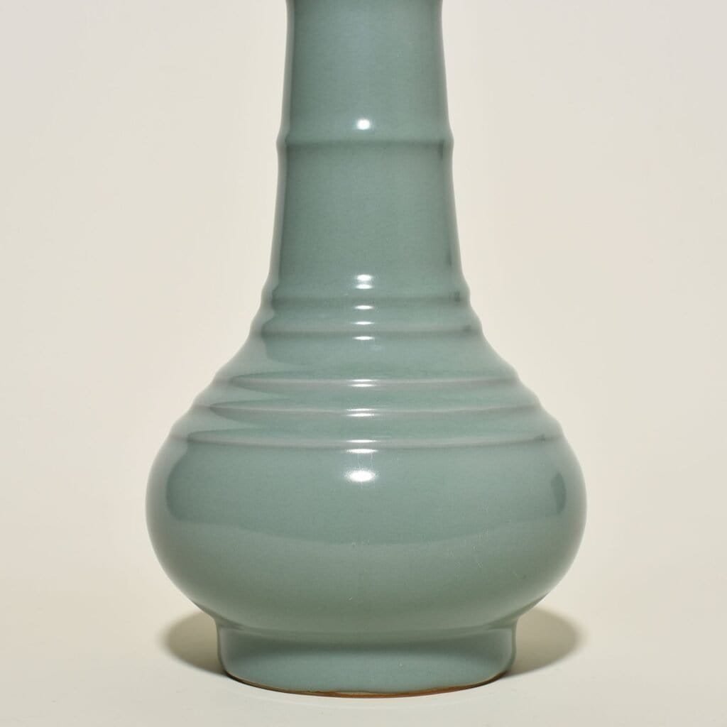 Song Dynasty Longquan kiln pink celadon glaze dazzling pattern plate mouth vase engraved with imperial inscription