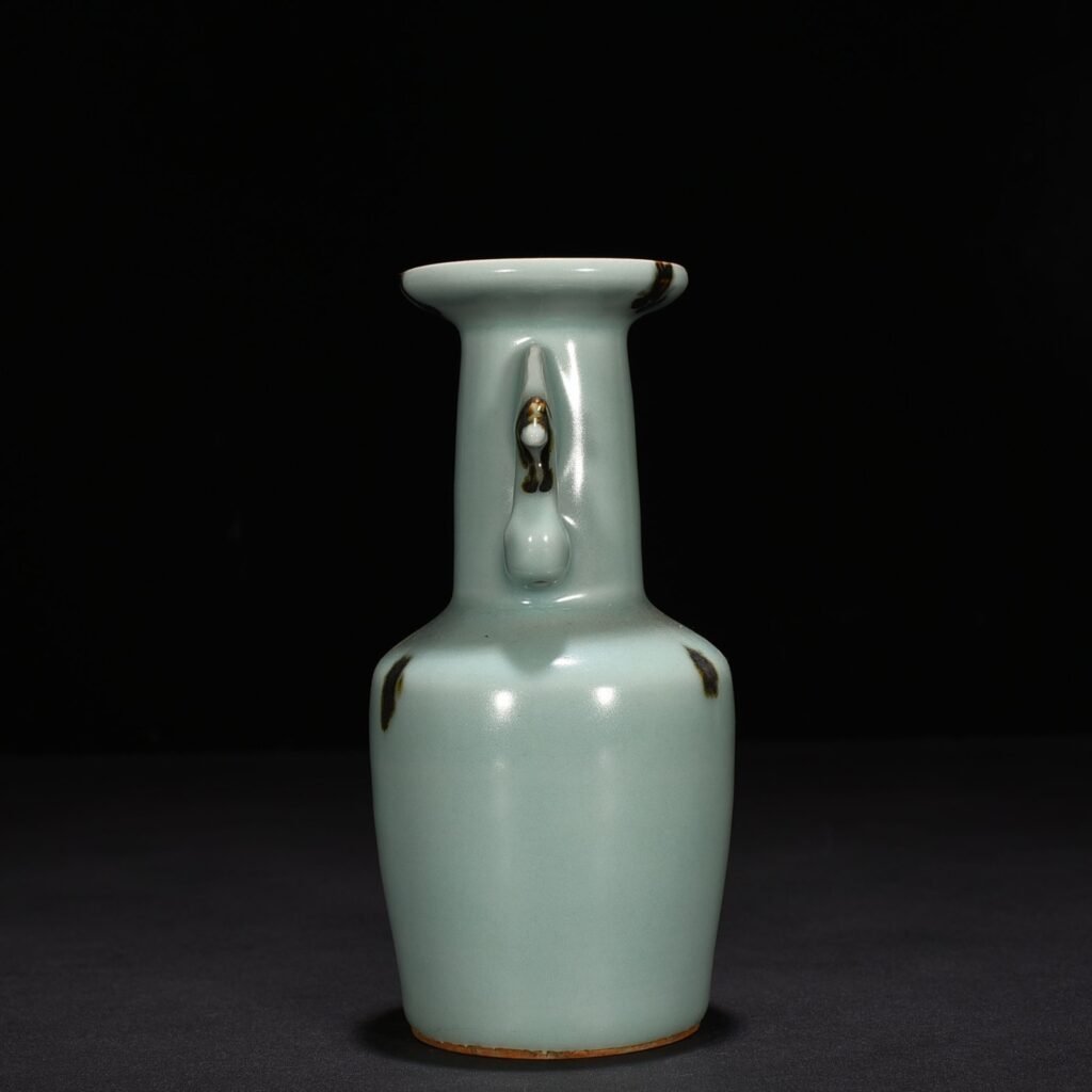 Song Dynasty Longquan kiln pink green glaze dotted phoenix ear vase