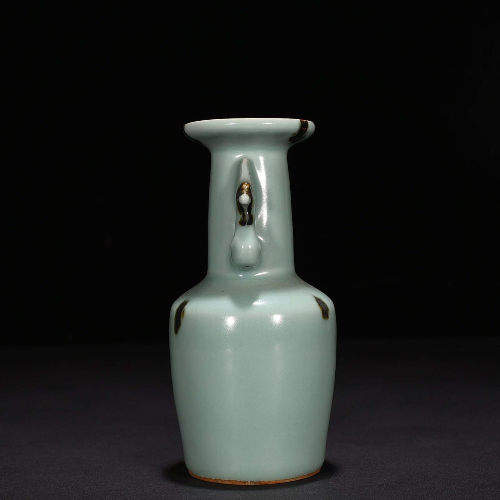 Song Dynasty Longquan kiln pink green glaze dotted phoenix ear vase