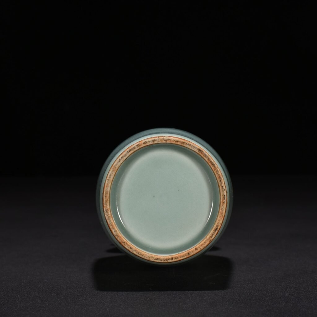 Song Dynasty Longquan kiln pink green glaze dotted phoenix ear vase