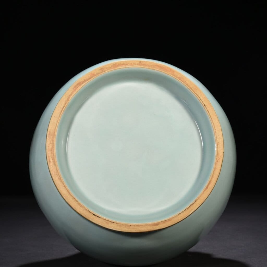 Song Dynasty Longquan kiln pink celadon glaze Panlong vase