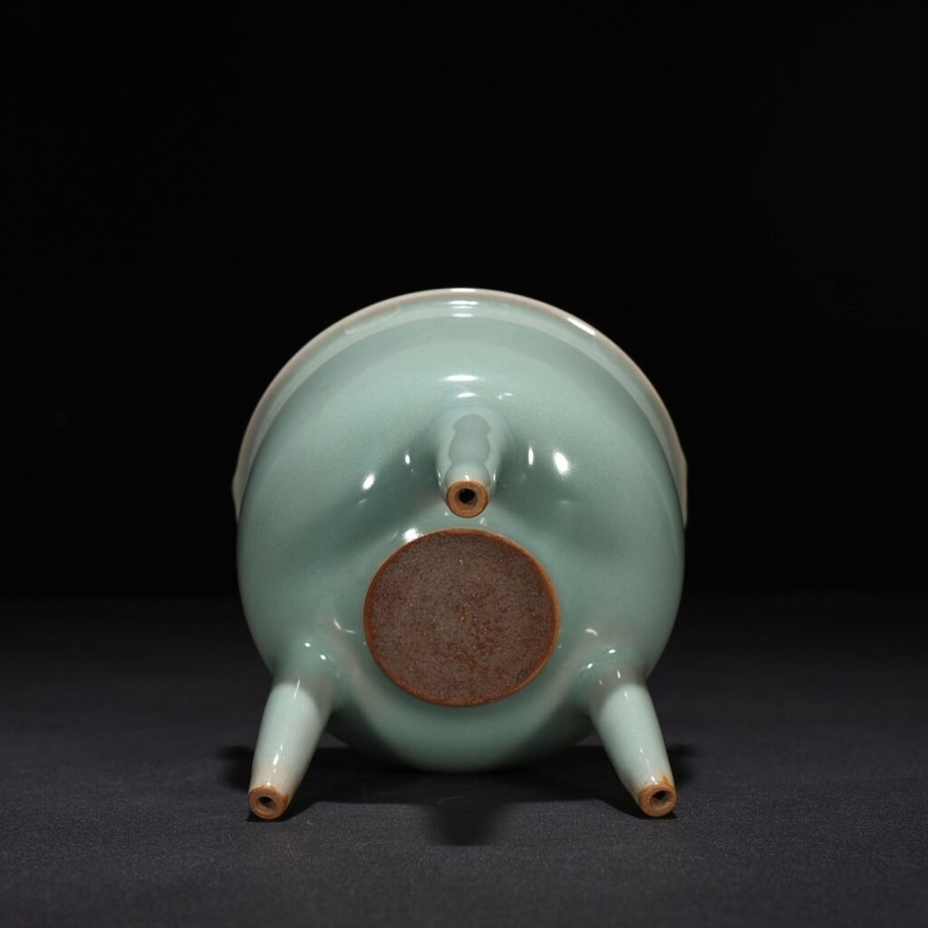 Song Dynasty Longquan kiln pink celadon glaze tube foot double ear furnace