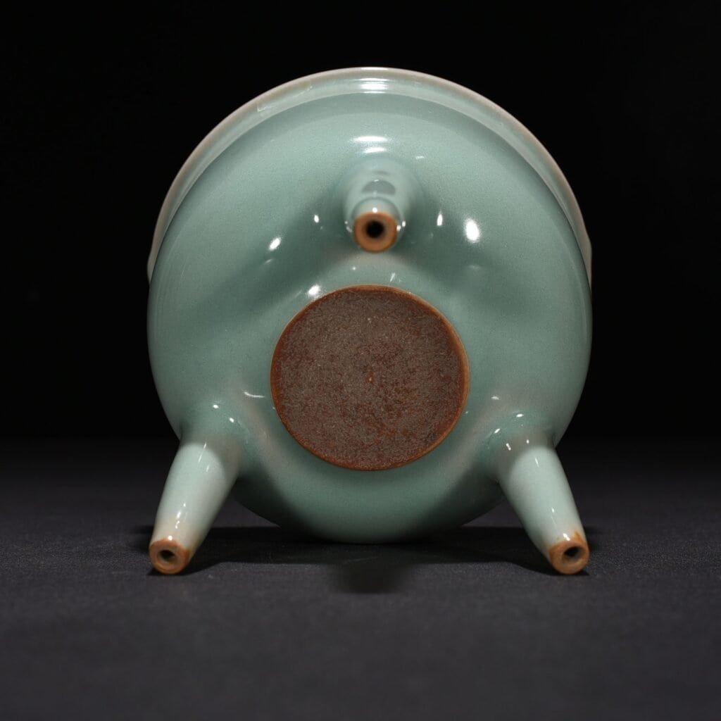 Song Dynasty Longquan kiln pink celadon glaze tube foot double ear furnace