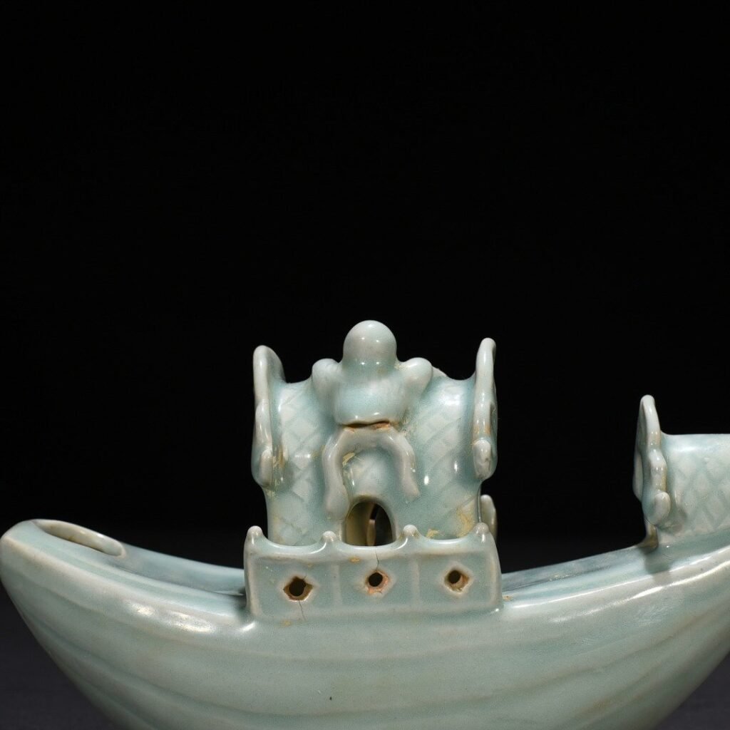 Song Dynasty Longquan kiln pink celadon glaze boat-shaped water drop inkstone