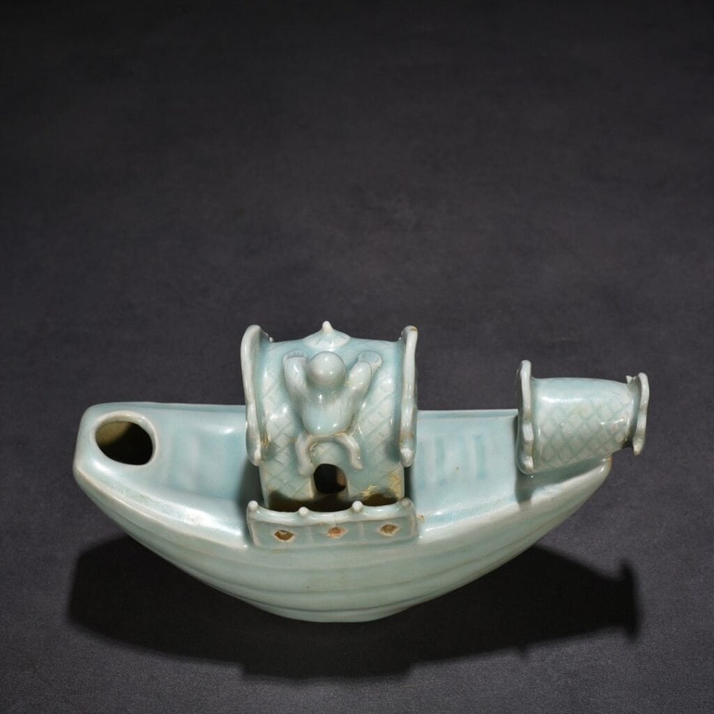 Song Dynasty Longquan kiln pink celadon glaze boat-shaped water drop inkstone