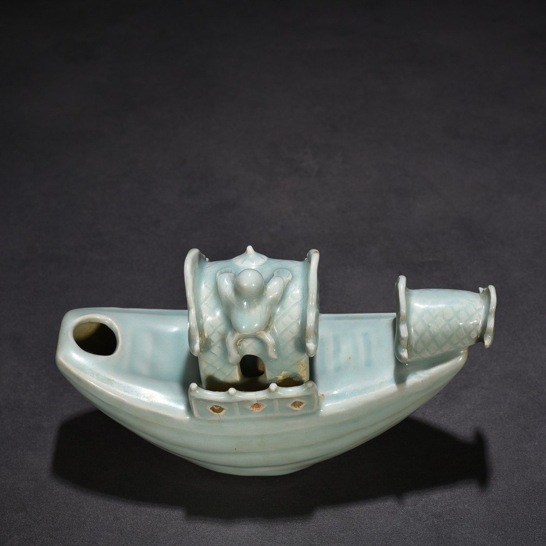 Song Dynasty Longquan kiln pink celadon glaze boat-shaped water drop inkstone