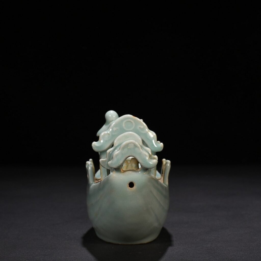 Song Dynasty Longquan kiln pink celadon glaze boat-shaped water drop inkstone