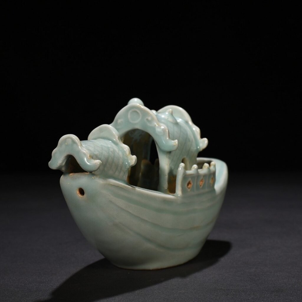 Song Dynasty Longquan kiln pink celadon glaze boat-shaped water drop inkstone