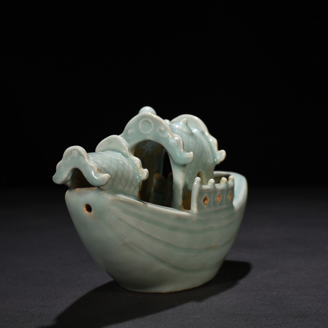 Song Dynasty Longquan kiln pink celadon glaze boat-shaped water drop inkstone