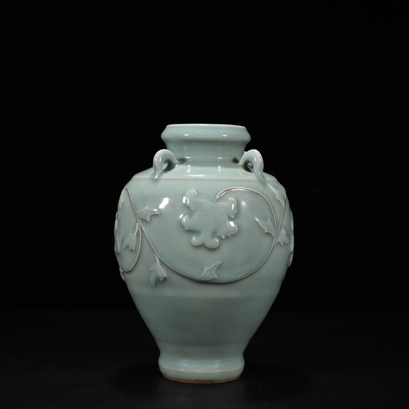 Song Dynasty Longquan kiln pink celadon glaze laminated flower pattern four-series bottle