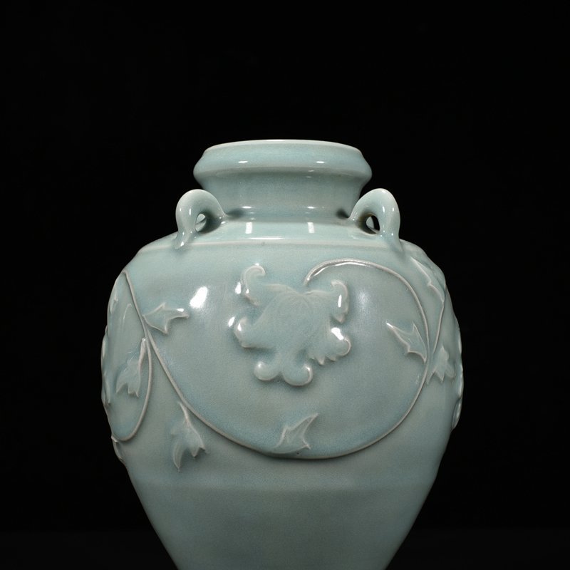 Song Dynasty Longquan kiln pink celadon glaze laminated flower pattern four-series bottle