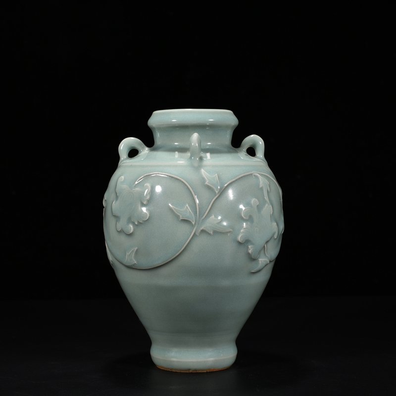 Song Dynasty Longquan kiln pink celadon glaze laminated flower pattern four-series bottle