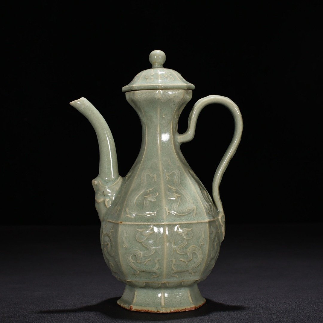 Song Dynasty Longquan kiln pink celadon glaze carved chilong pattern eight-sided ewer