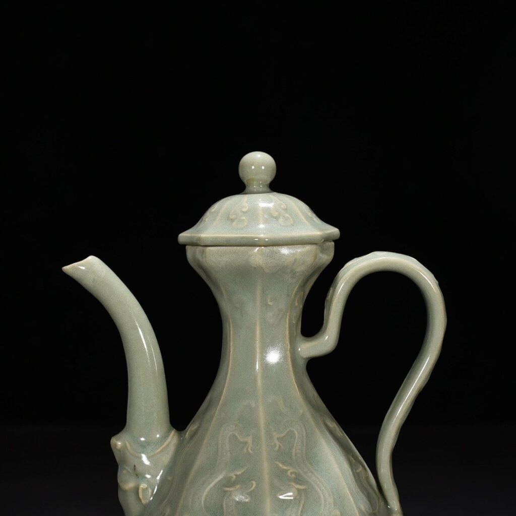 Song Dynasty Longquan kiln pink celadon glaze carved chilong pattern eight-sided ewer
