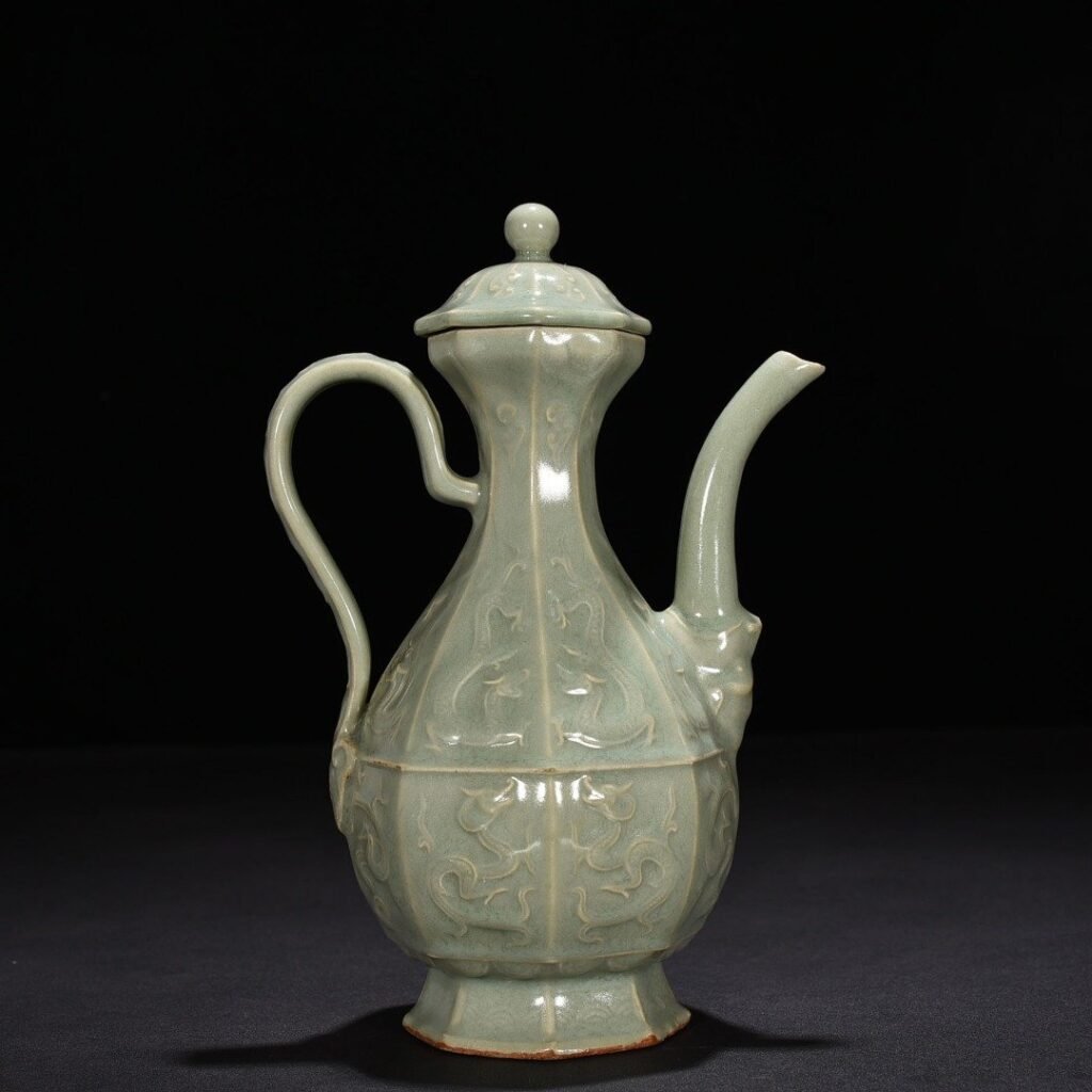 Song Dynasty Longquan kiln pink celadon glaze carved chilong pattern eight-sided ewer