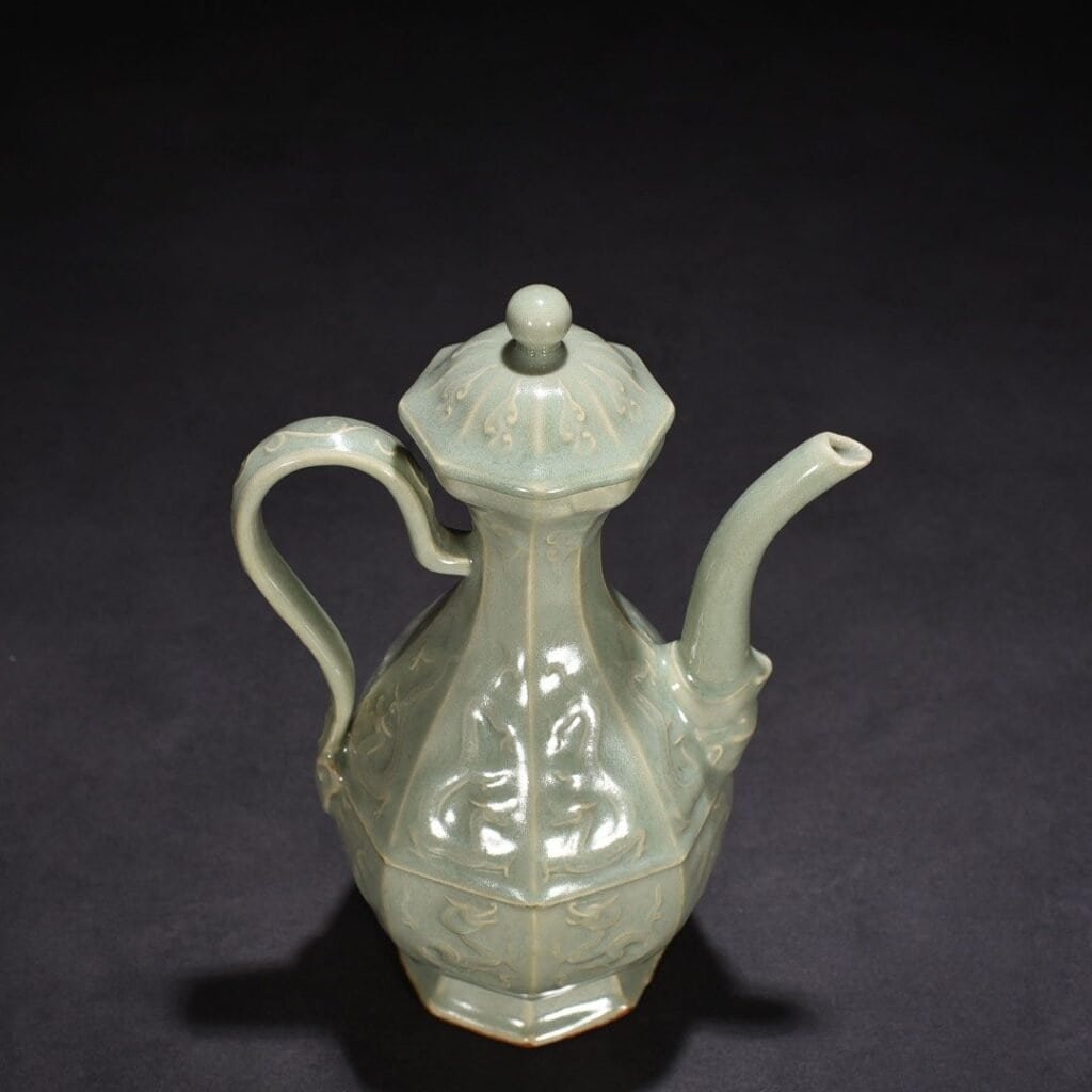 Song Dynasty Longquan kiln pink celadon glaze carved chilong pattern eight-sided ewer
