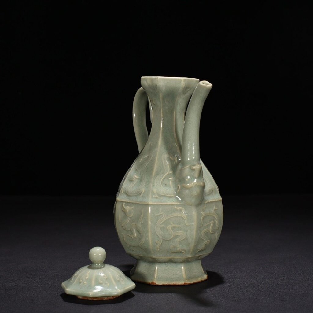 Song Dynasty Longquan kiln pink celadon glaze carved chilong pattern eight-sided ewer