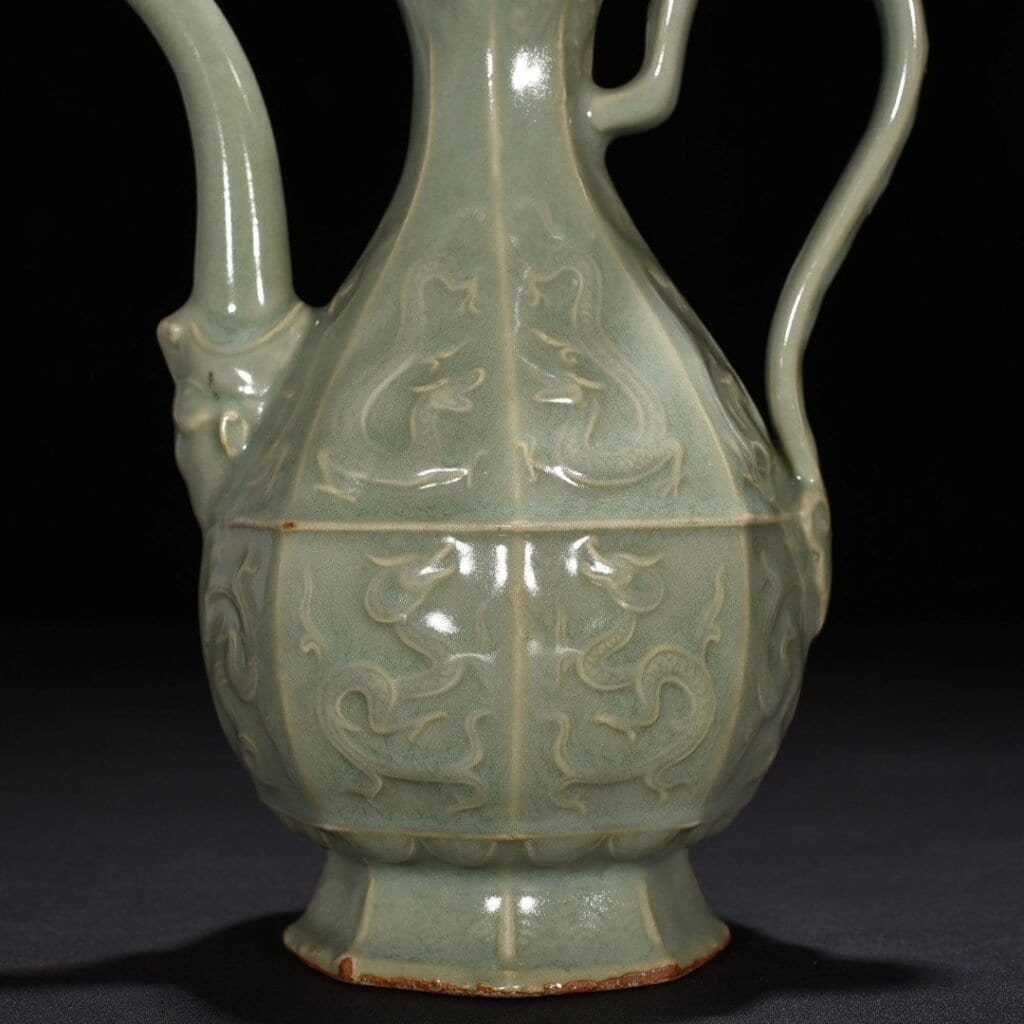 Song Dynasty Longquan kiln pink celadon glaze carved chilong pattern eight-sided ewer