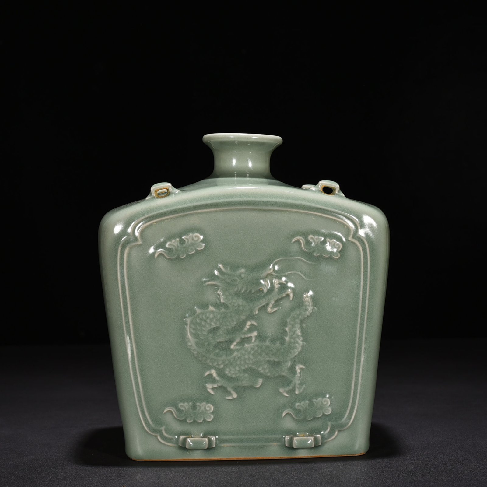 Song Dynasty Longquan kiln pink celadon glaze carved dragon pattern threaded flat bottle