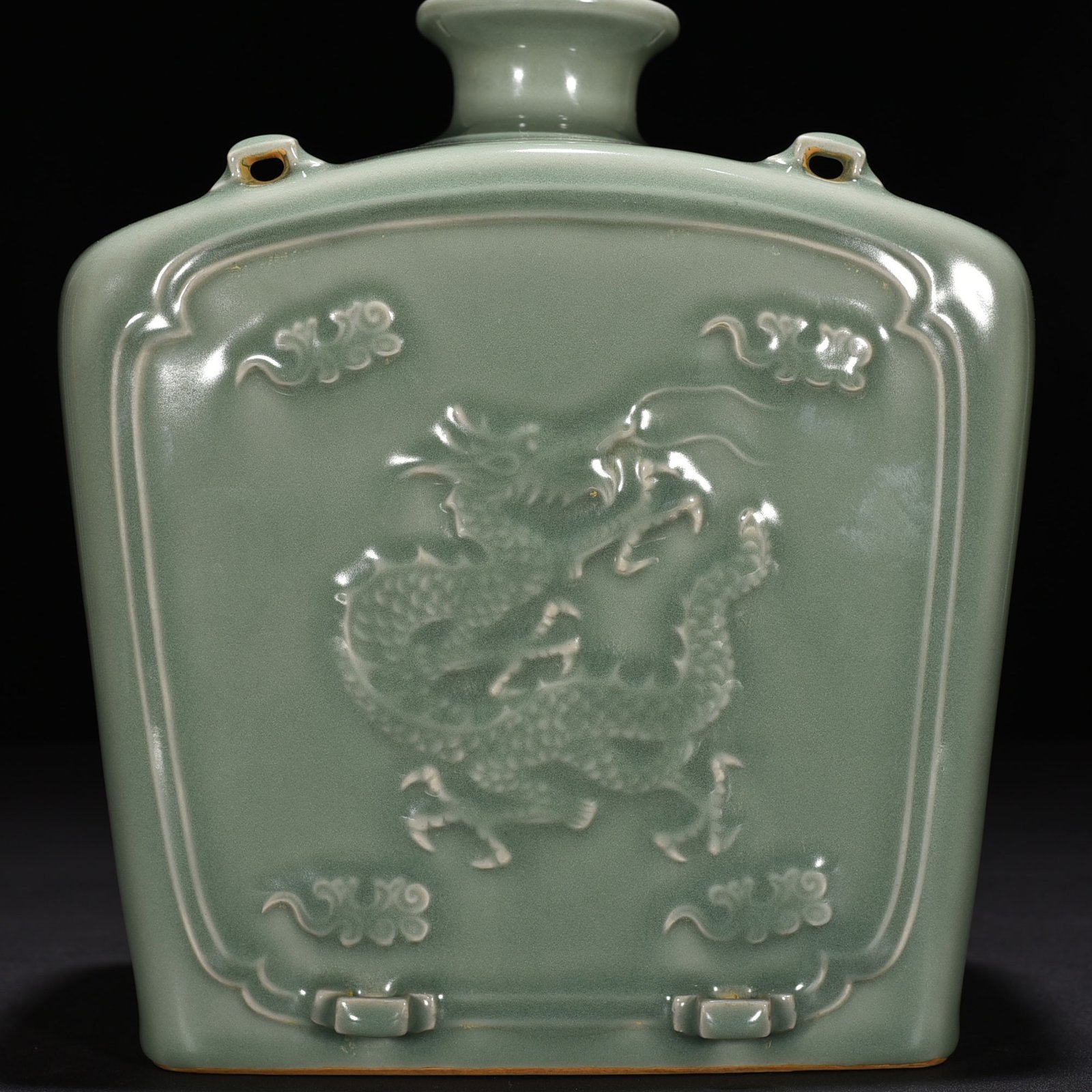 Song Dynasty Longquan kiln pink celadon glaze carved dragon pattern threaded flat bottle