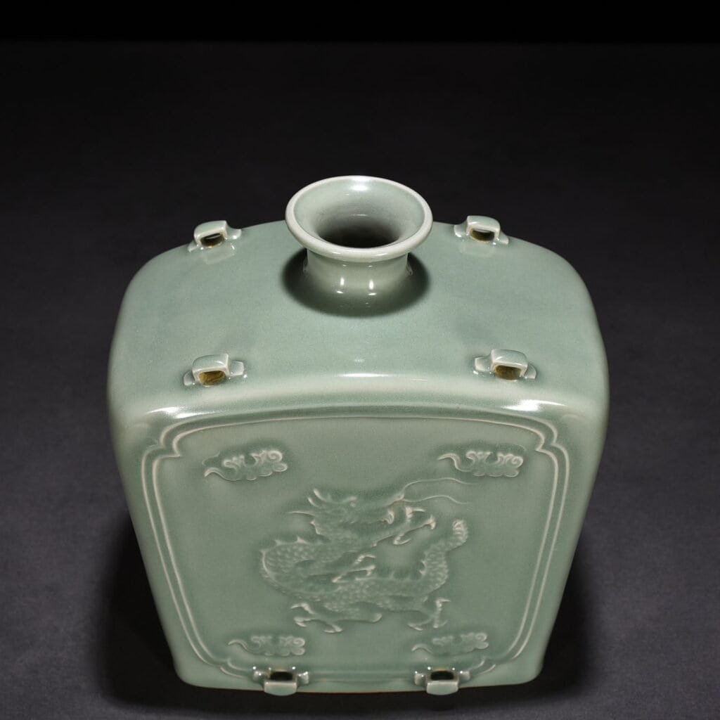 Song Dynasty Longquan kiln pink celadon glaze carved dragon pattern threaded flat bottle