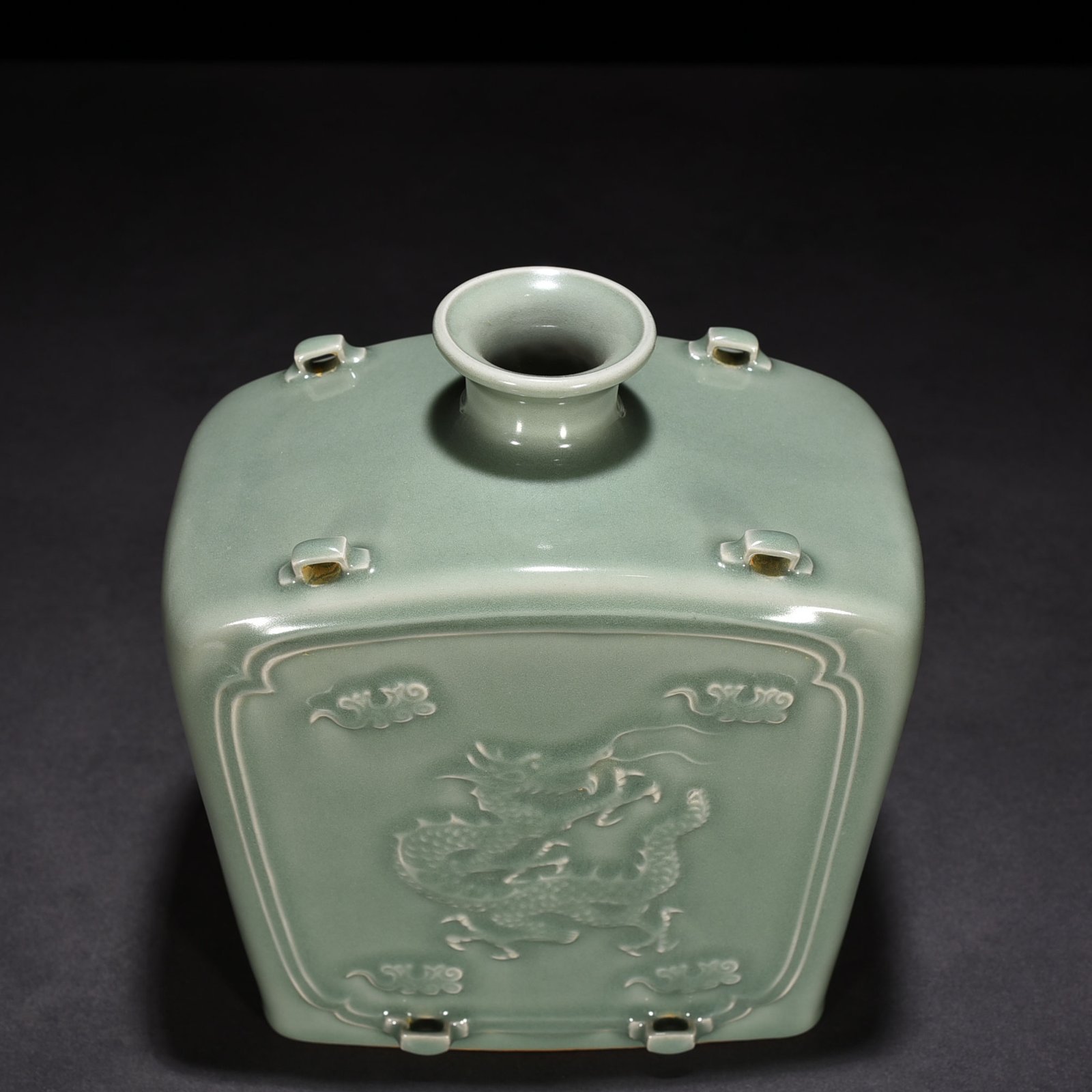 Song Dynasty Longquan kiln pink celadon glaze carved dragon pattern threaded flat bottle