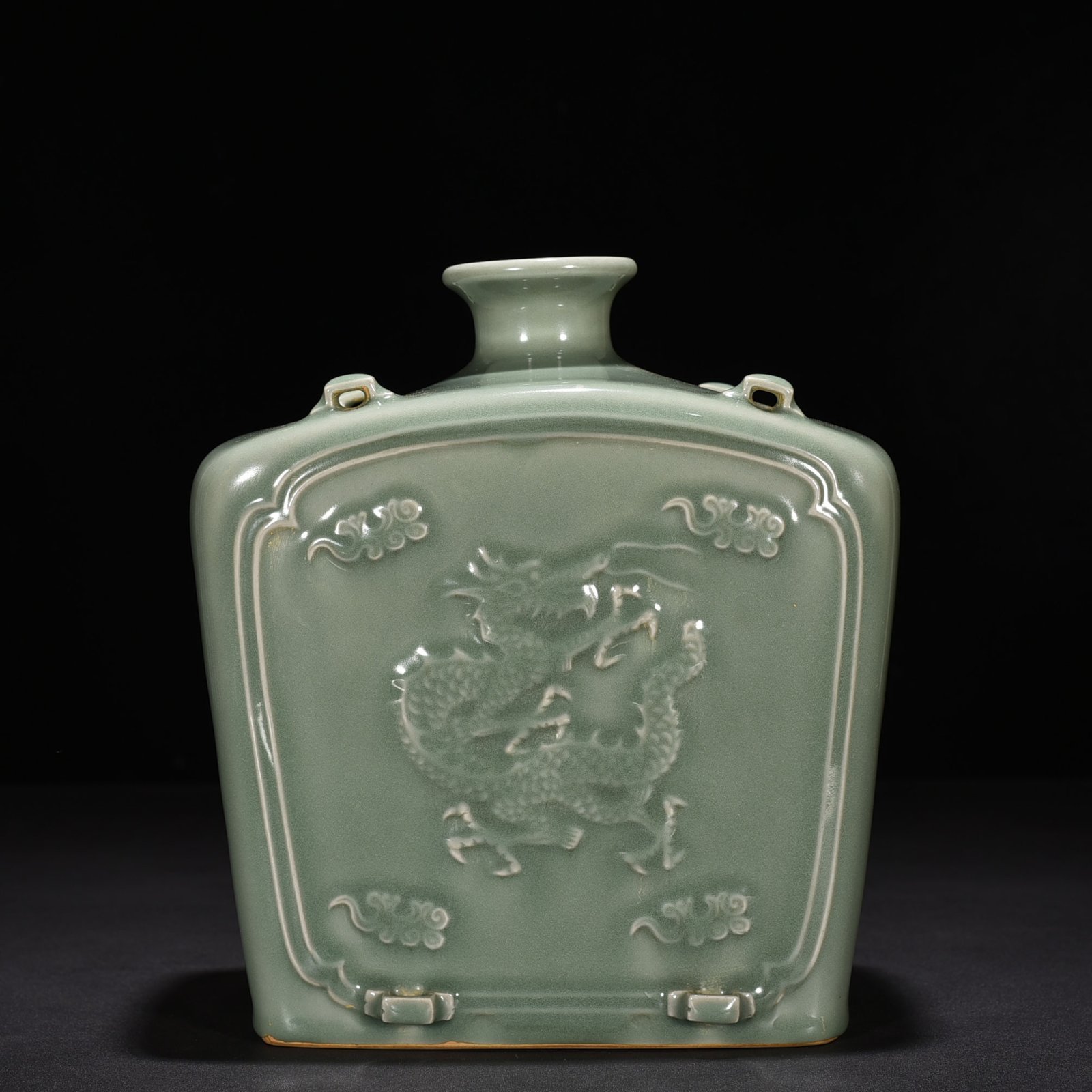 Song Dynasty Longquan kiln pink celadon glaze carved dragon pattern threaded flat bottle
