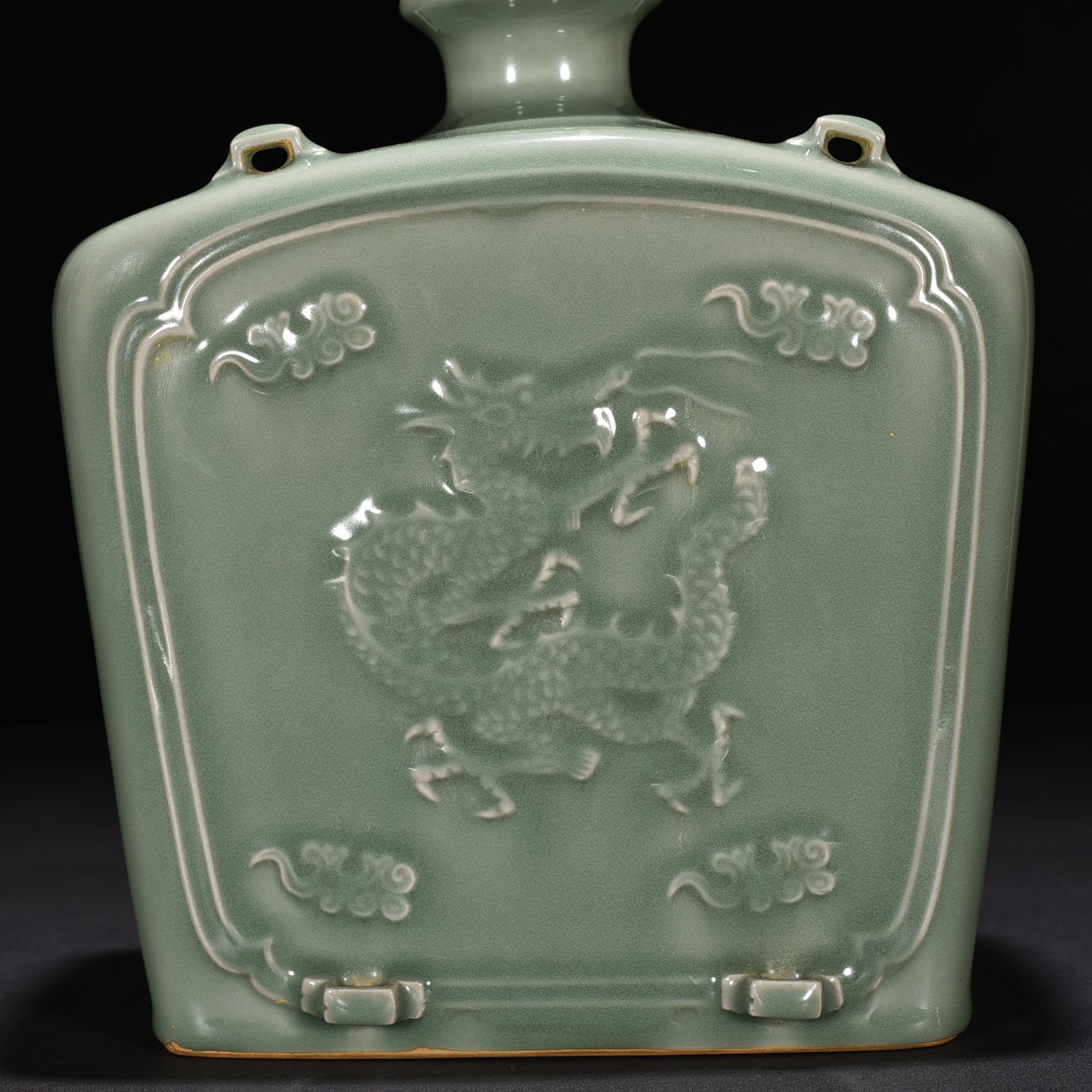 Song Dynasty Longquan kiln pink celadon glaze carved dragon pattern threaded flat bottle