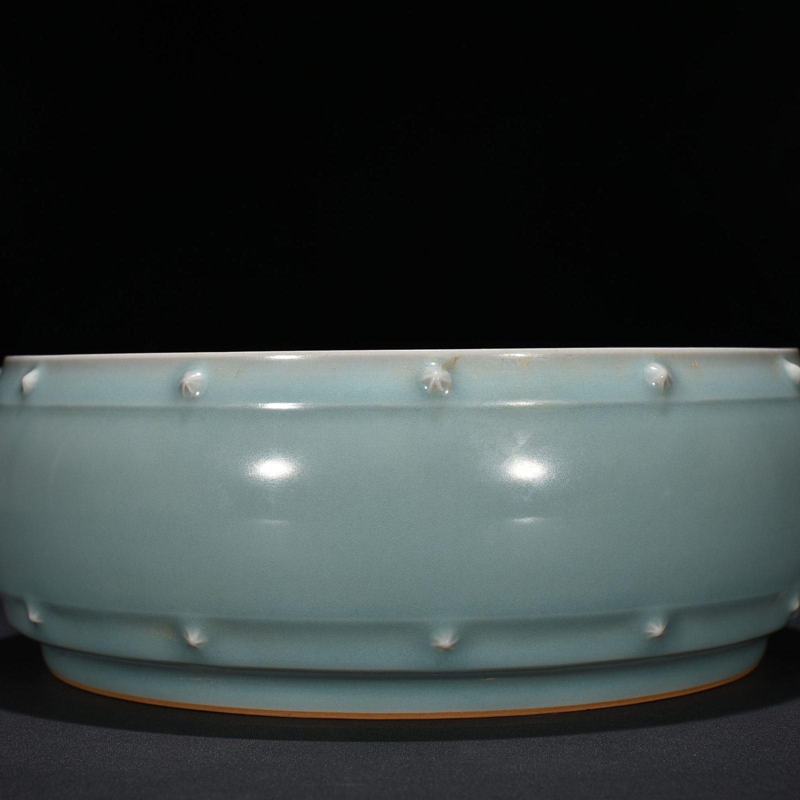 Song Dynasty Longquan kiln pink celadon glaze drum nail wash imperial inscription