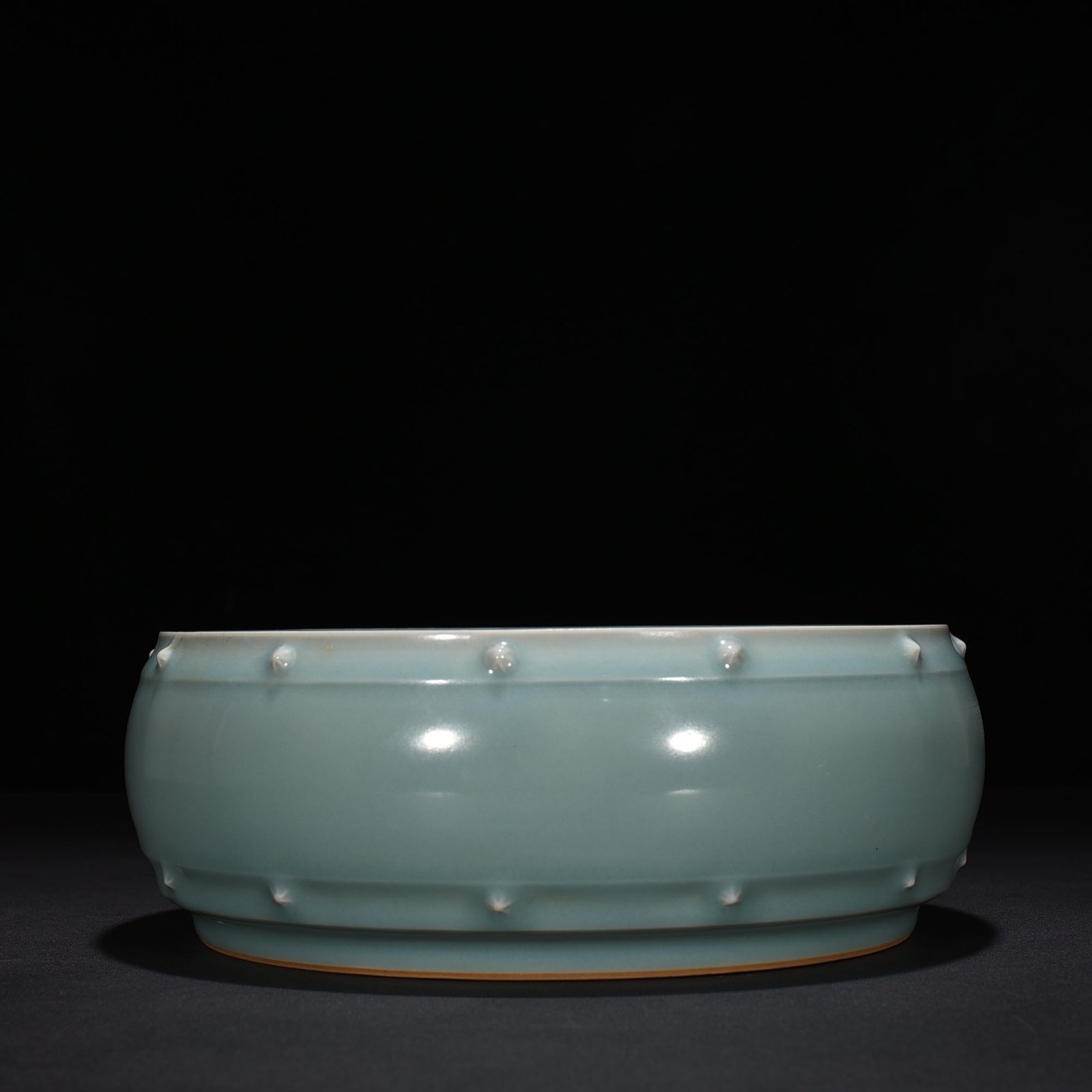 Song Dynasty Longquan kiln pink celadon glaze drum nail wash imperial inscription