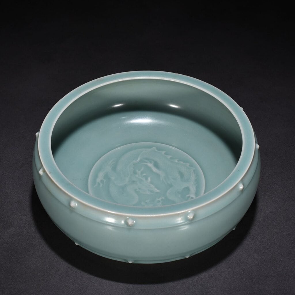 Song Dynasty Longquan kiln pink celadon glaze drum nail wash imperial inscription