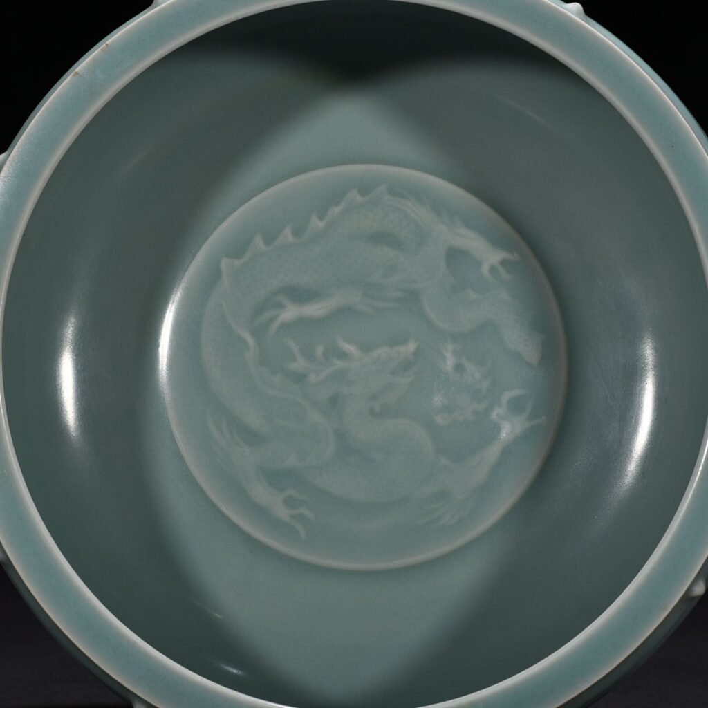 Song Dynasty Longquan kiln pink celadon glaze drum nail wash imperial inscription