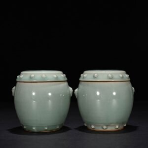 Song Dynasty Longquan kiln pink celadon glaze drum nail lid jar