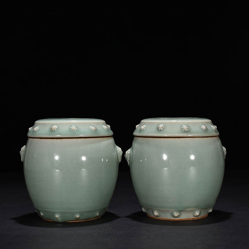 Song Dynasty Longquan kiln pink celadon glaze drum nail lid jar