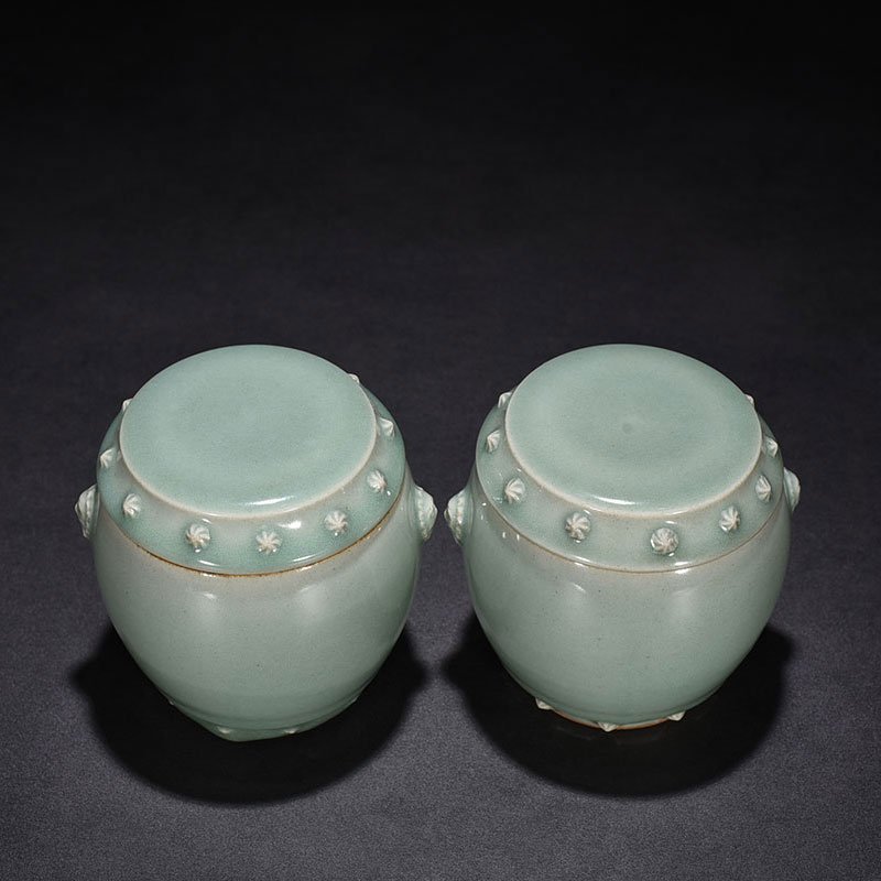 Song Dynasty Longquan kiln pink celadon glaze drum nail lid jar