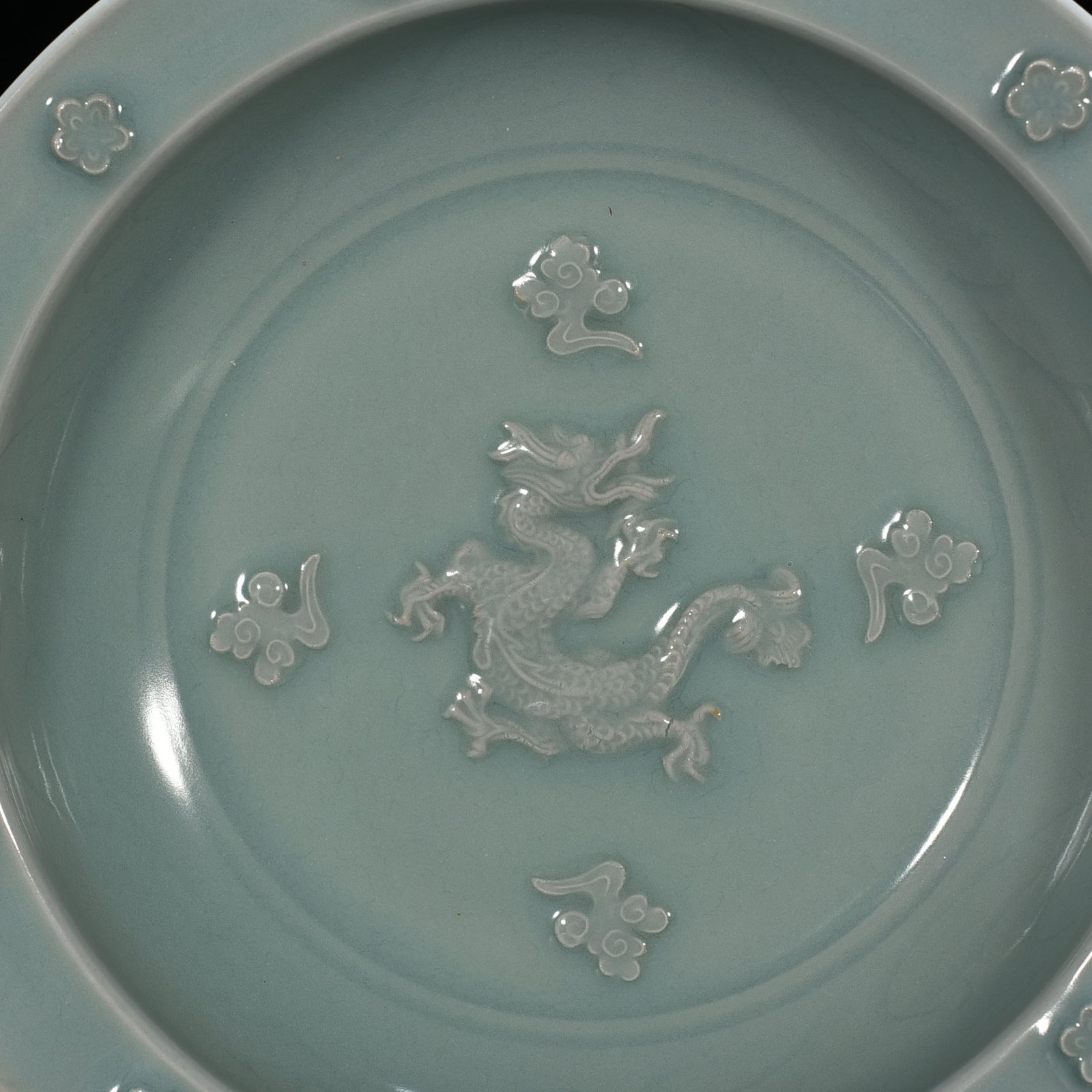 Song Dynasty Longquan kiln pink celadon glaze dragon pattern folding edge plate