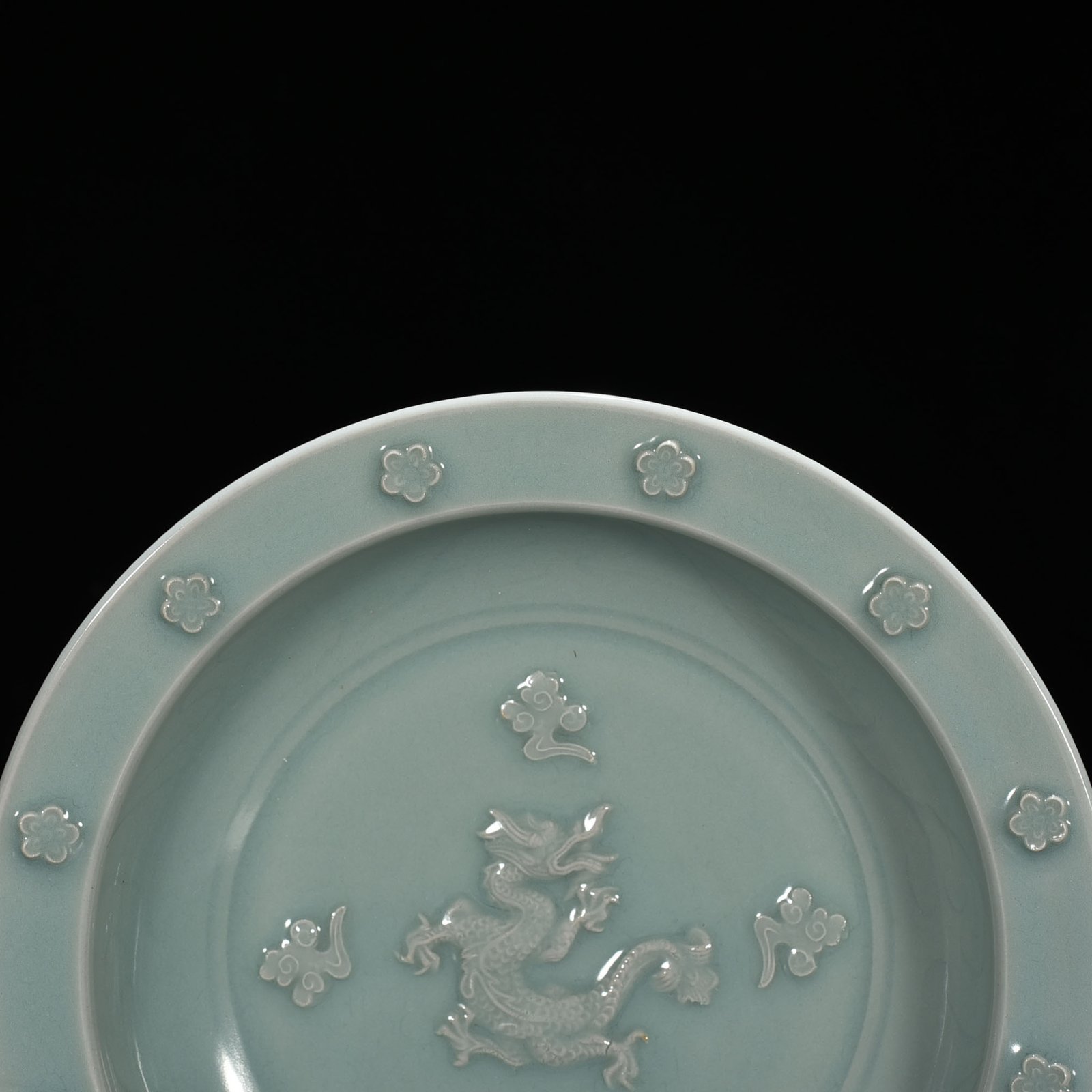 Song Dynasty Longquan kiln pink celadon glaze dragon pattern folding edge plate