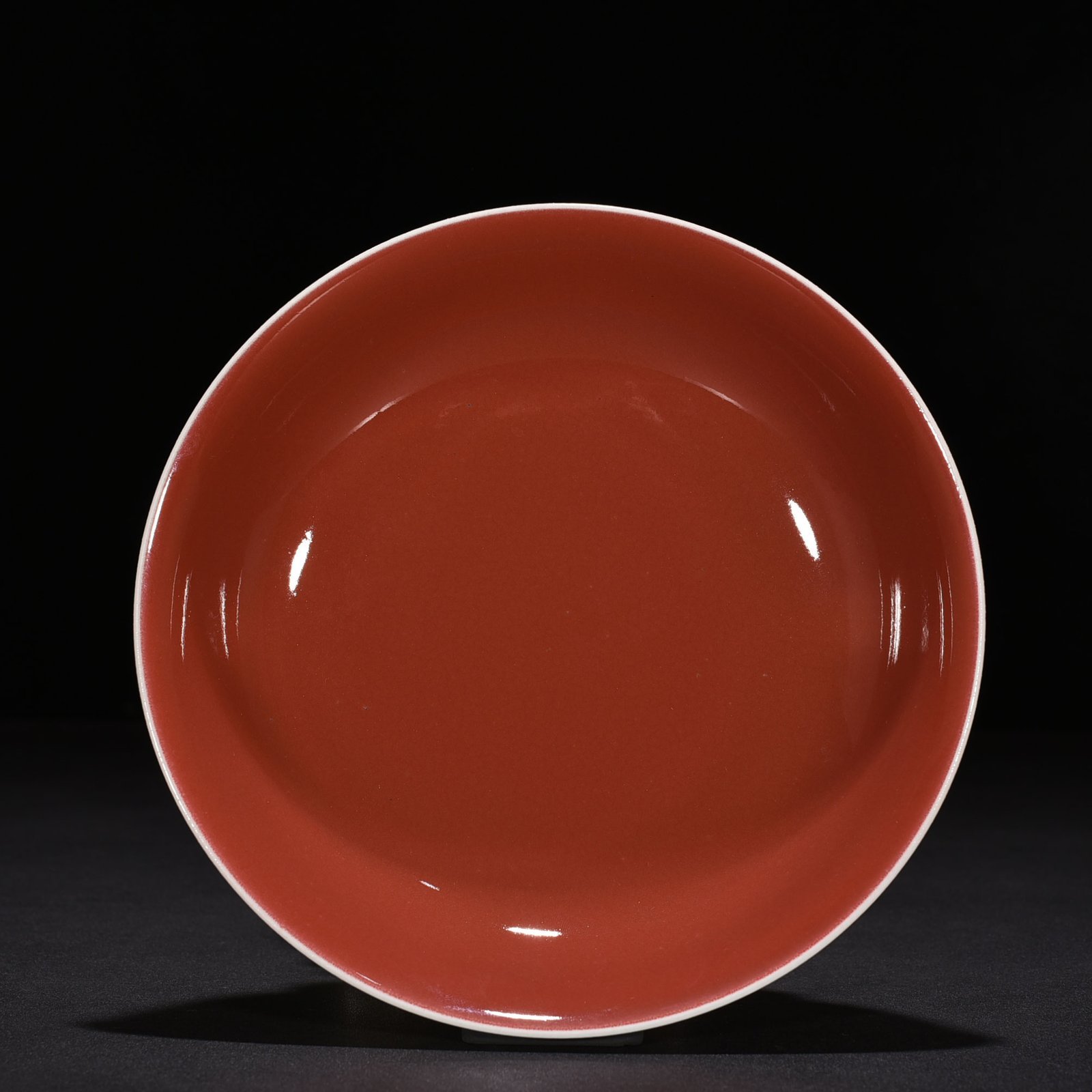 Qing Dynasty Qianlong ninth year commemorative red glaze plate