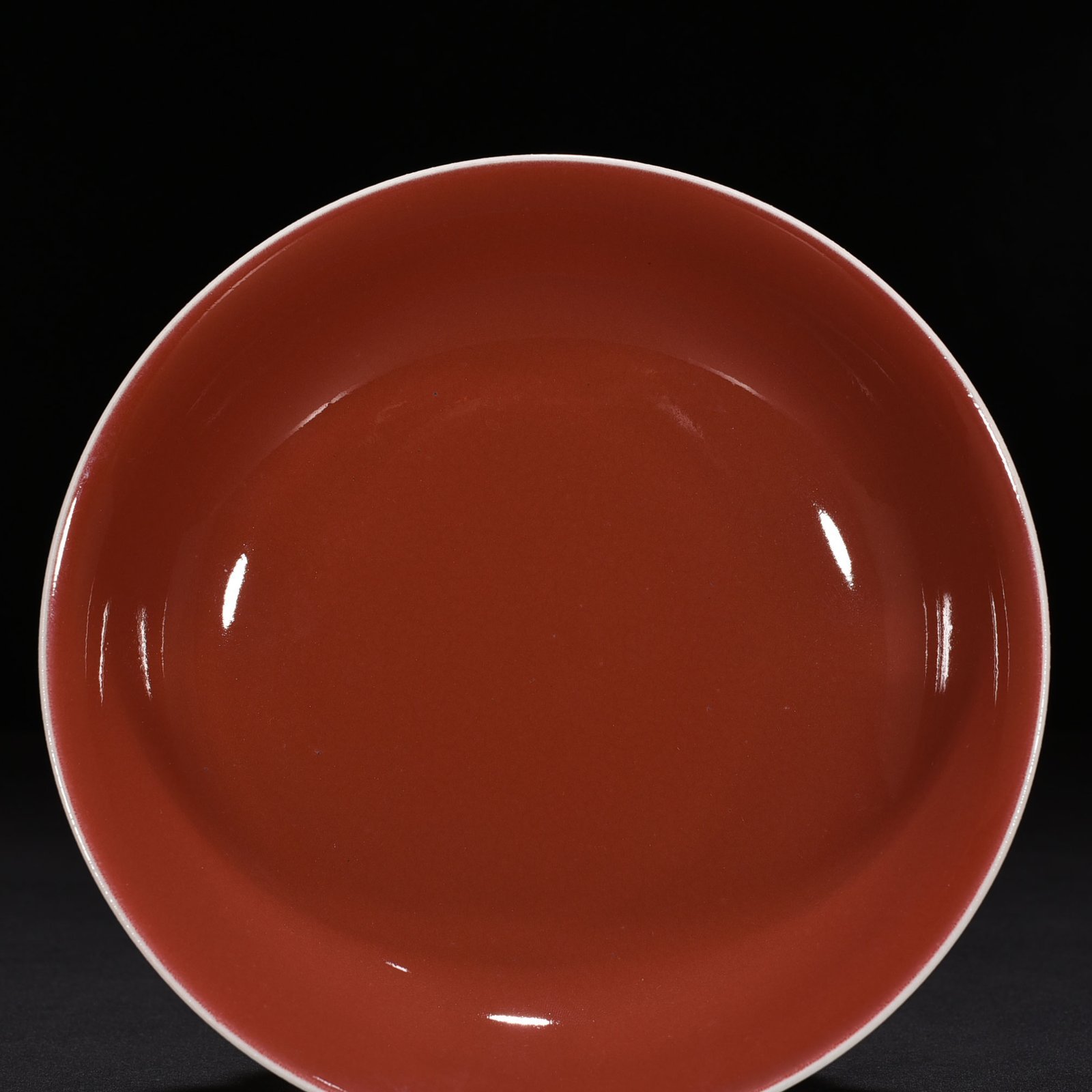 Qing Dynasty Qianlong ninth year commemorative red glaze plate