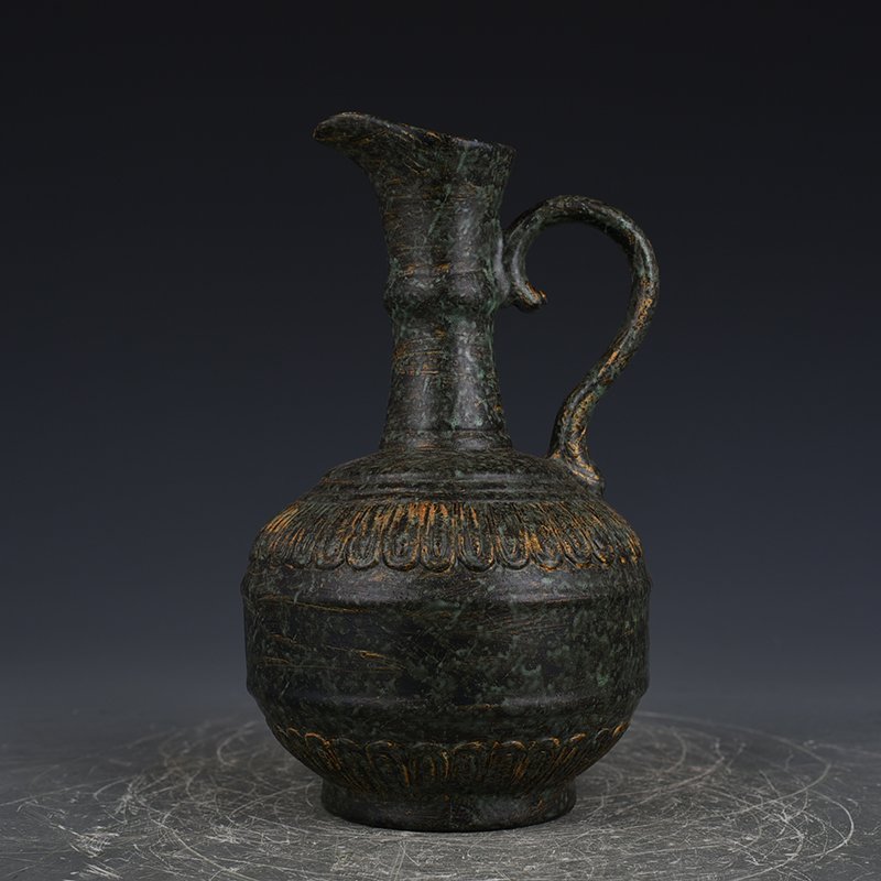 Qing Dynasty Qianlong bronze glaze flower pouring