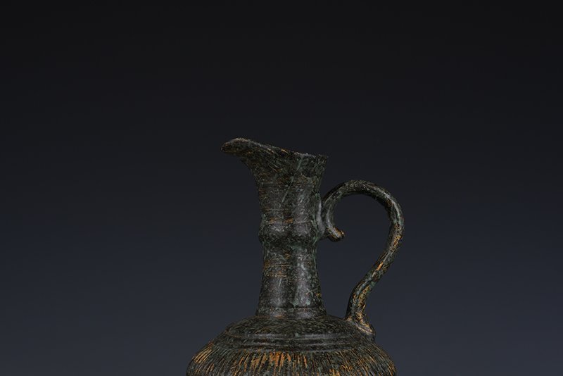 Qing Dynasty Qianlong bronze glaze flower pouring