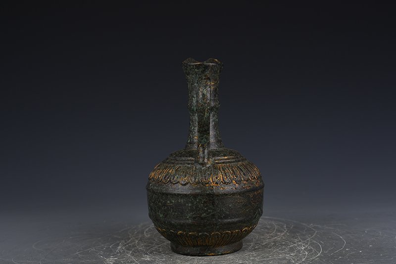 Qing Dynasty Qianlong bronze glaze flower pouring