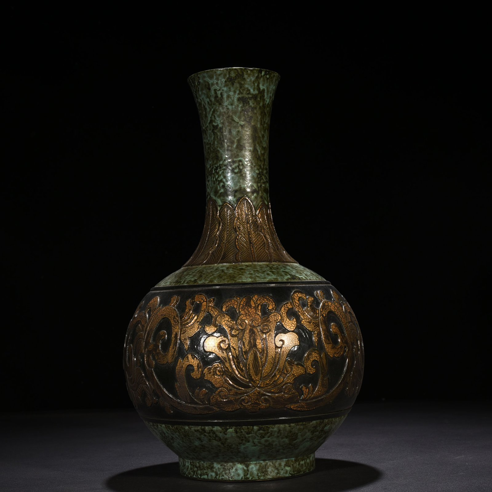 Qing Dynasty Qianlong bronze glaze carved vase with lotus pattern