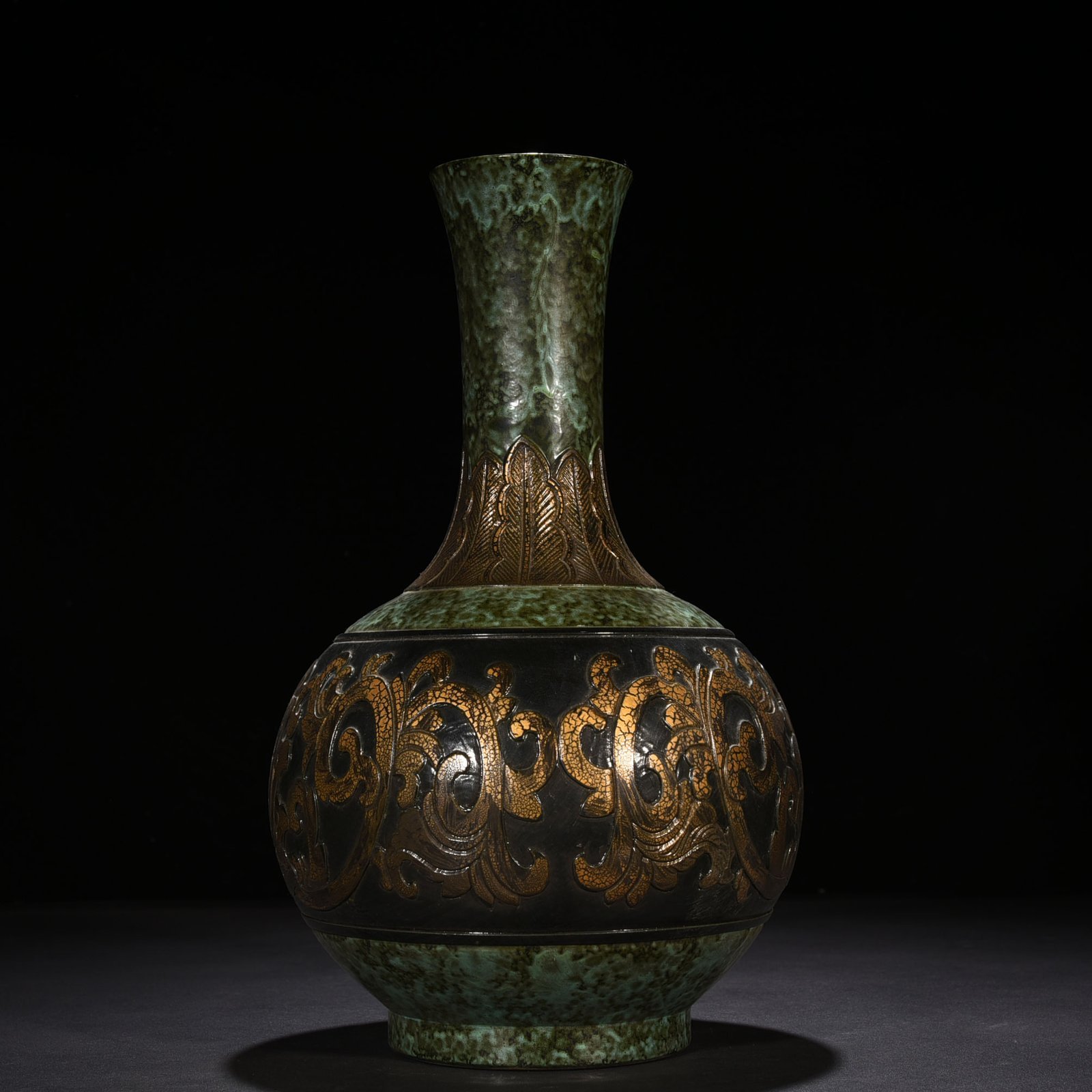 Qing Dynasty Qianlong bronze glaze carved vase with lotus pattern