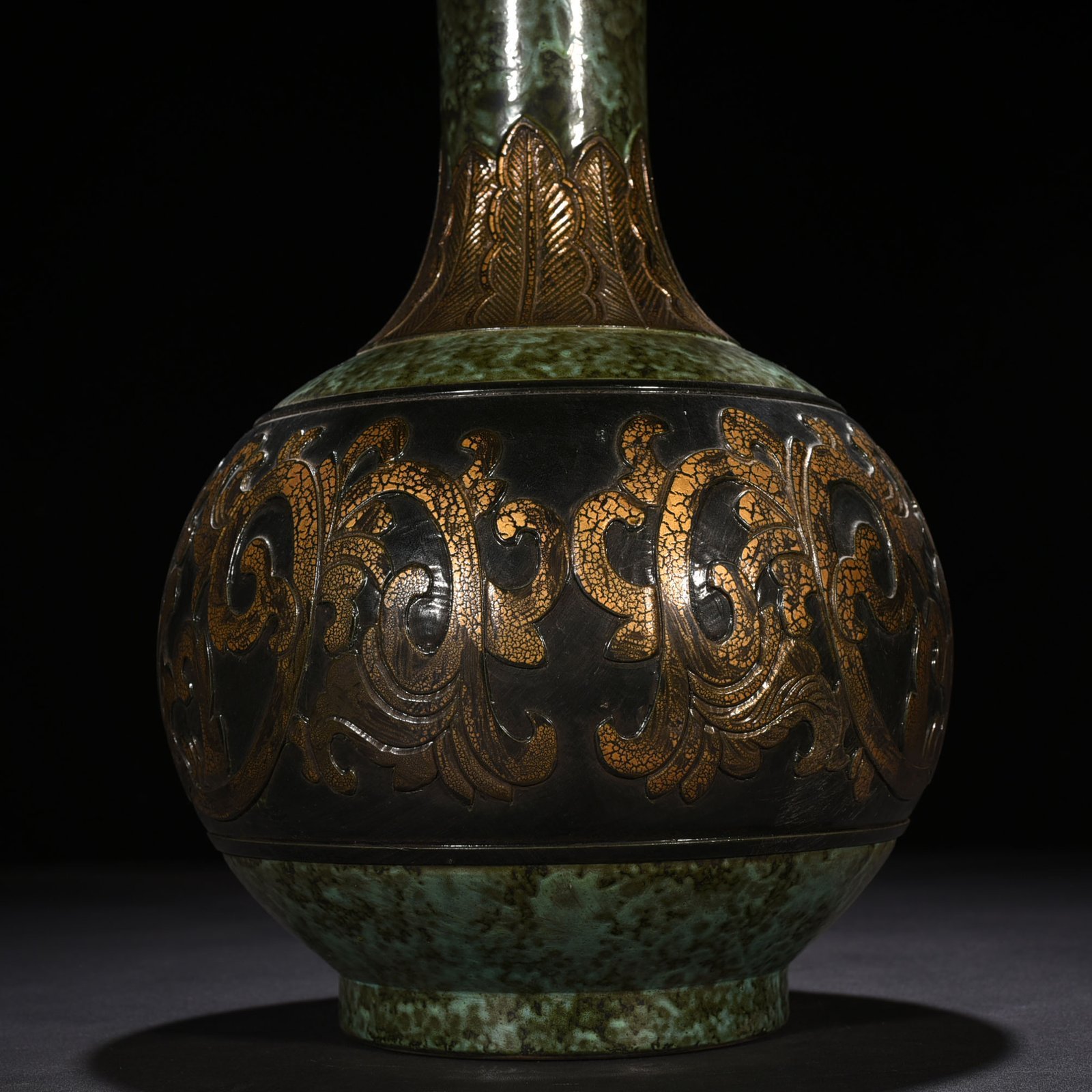 Qing Dynasty Qianlong bronze glaze carved vase with lotus pattern