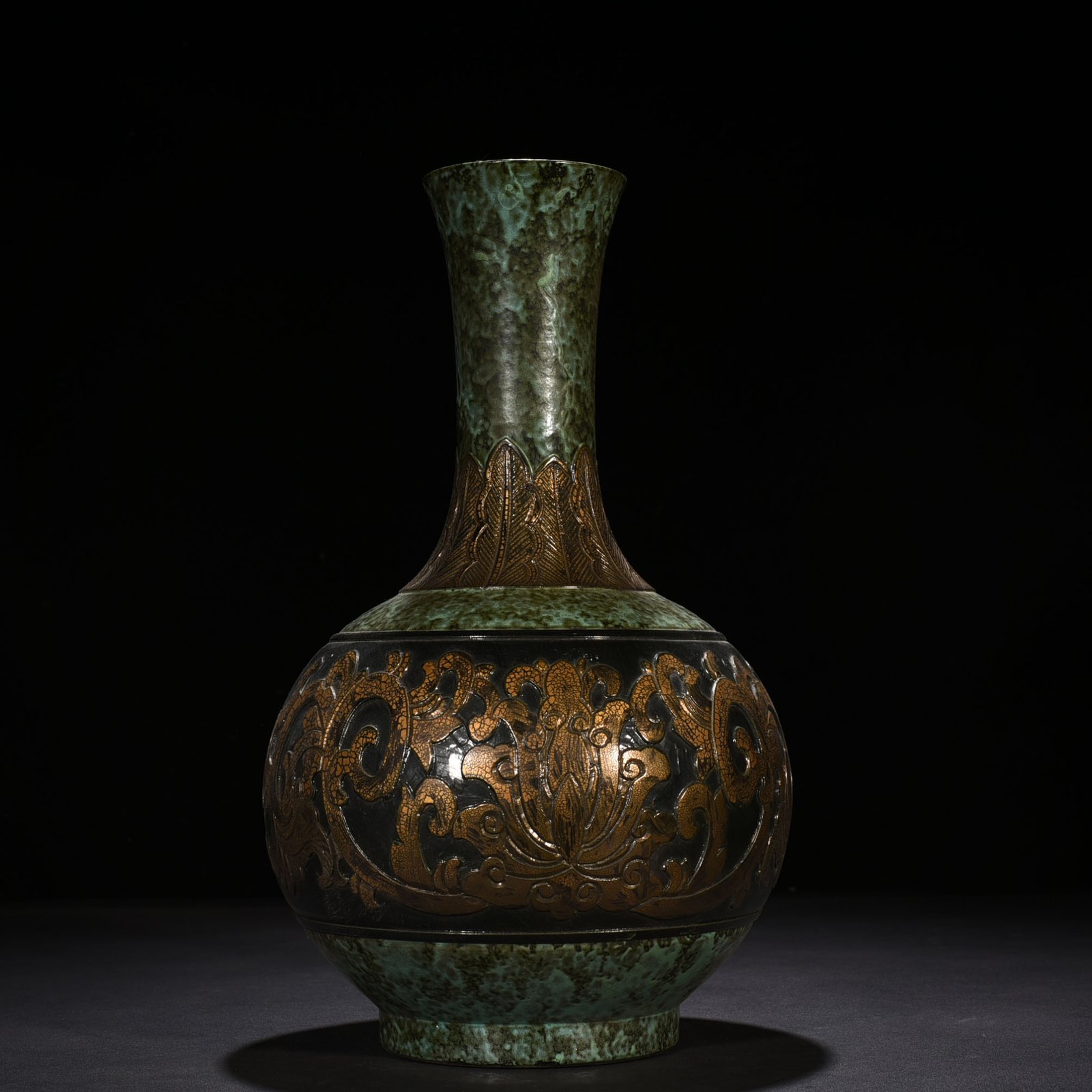Qing Dynasty Qianlong bronze glaze carved vase with lotus pattern