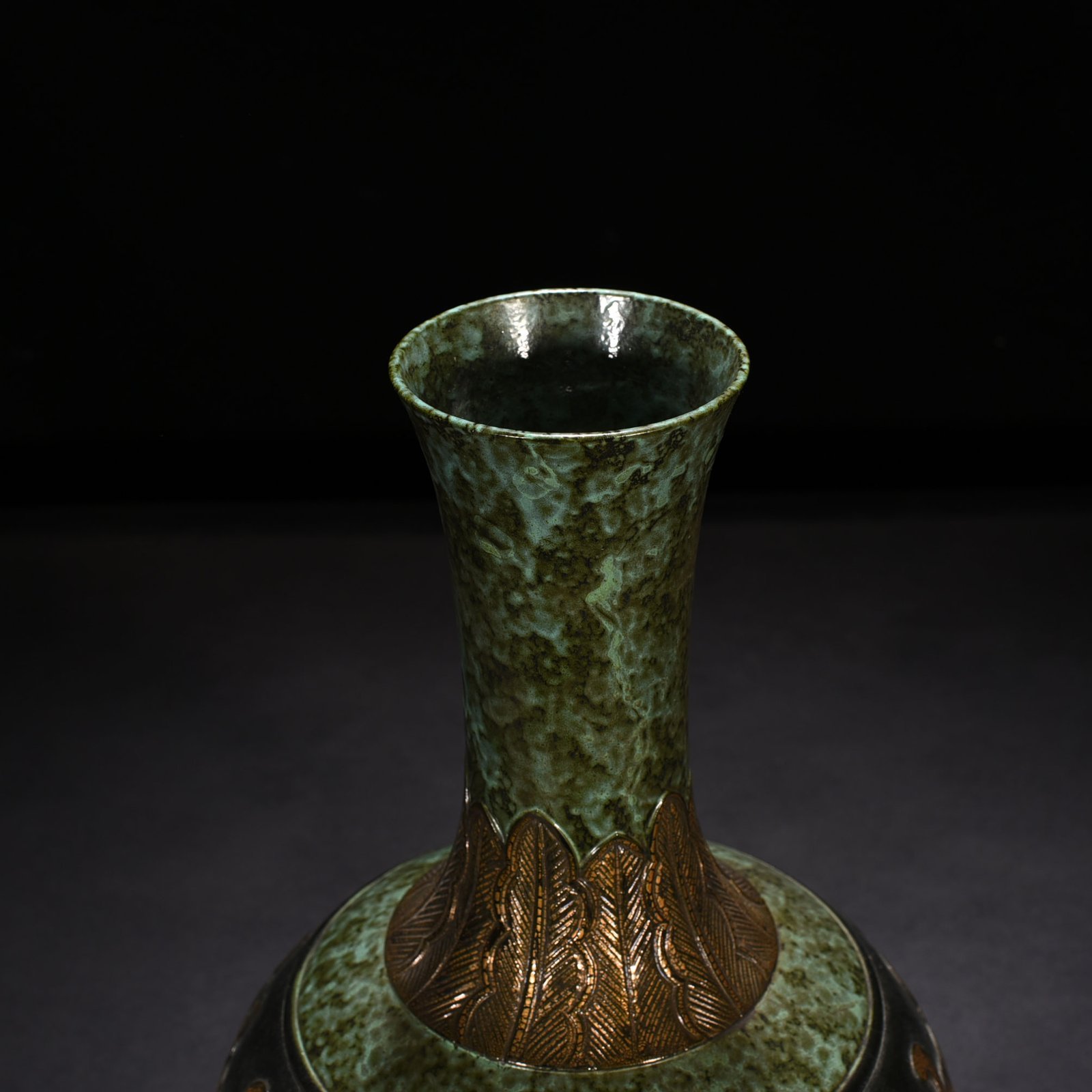 Qing Dynasty Qianlong bronze glaze carved vase with lotus pattern