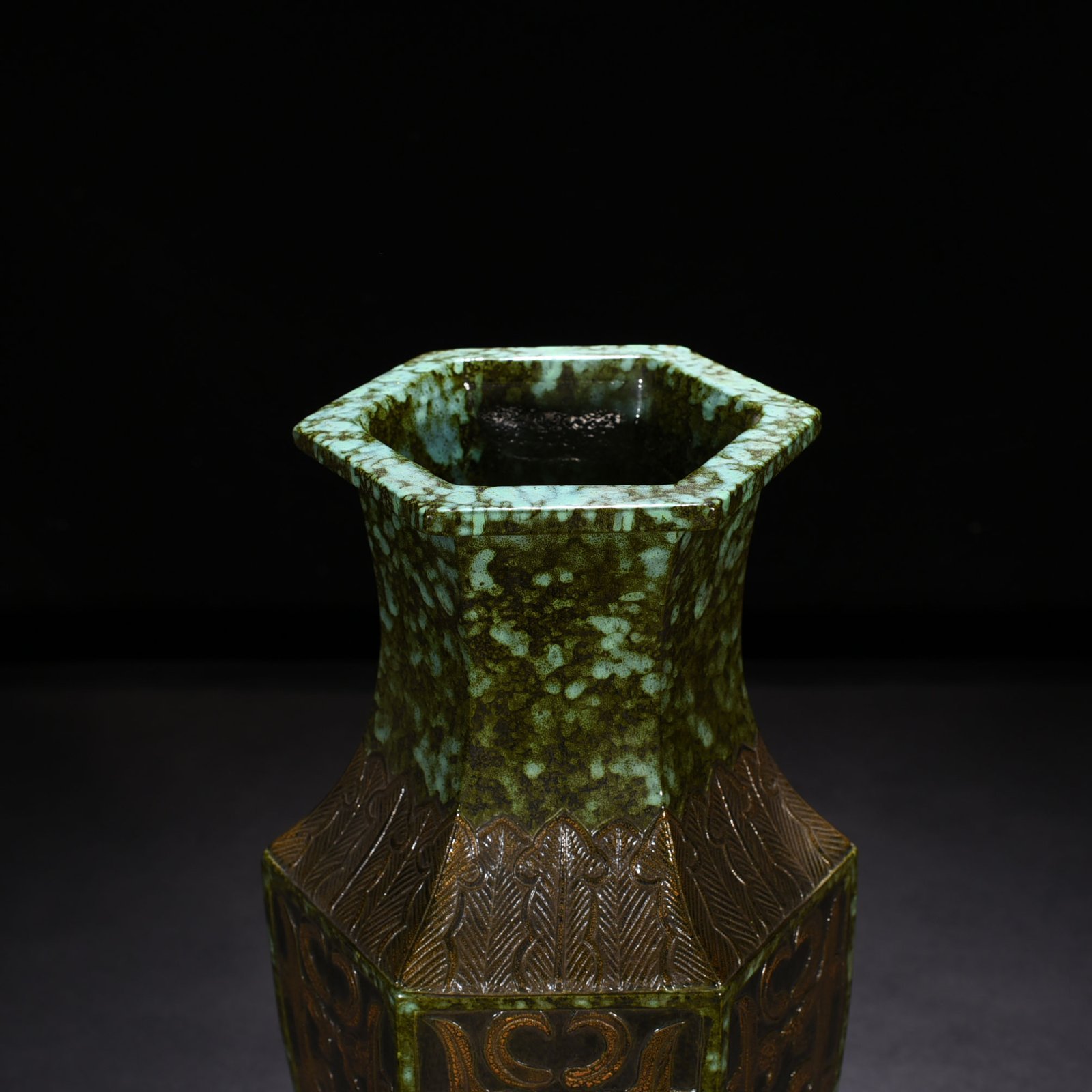 Qing Dynasty Qianlong bronze glaze hexagonal vase with carved chilong pattern