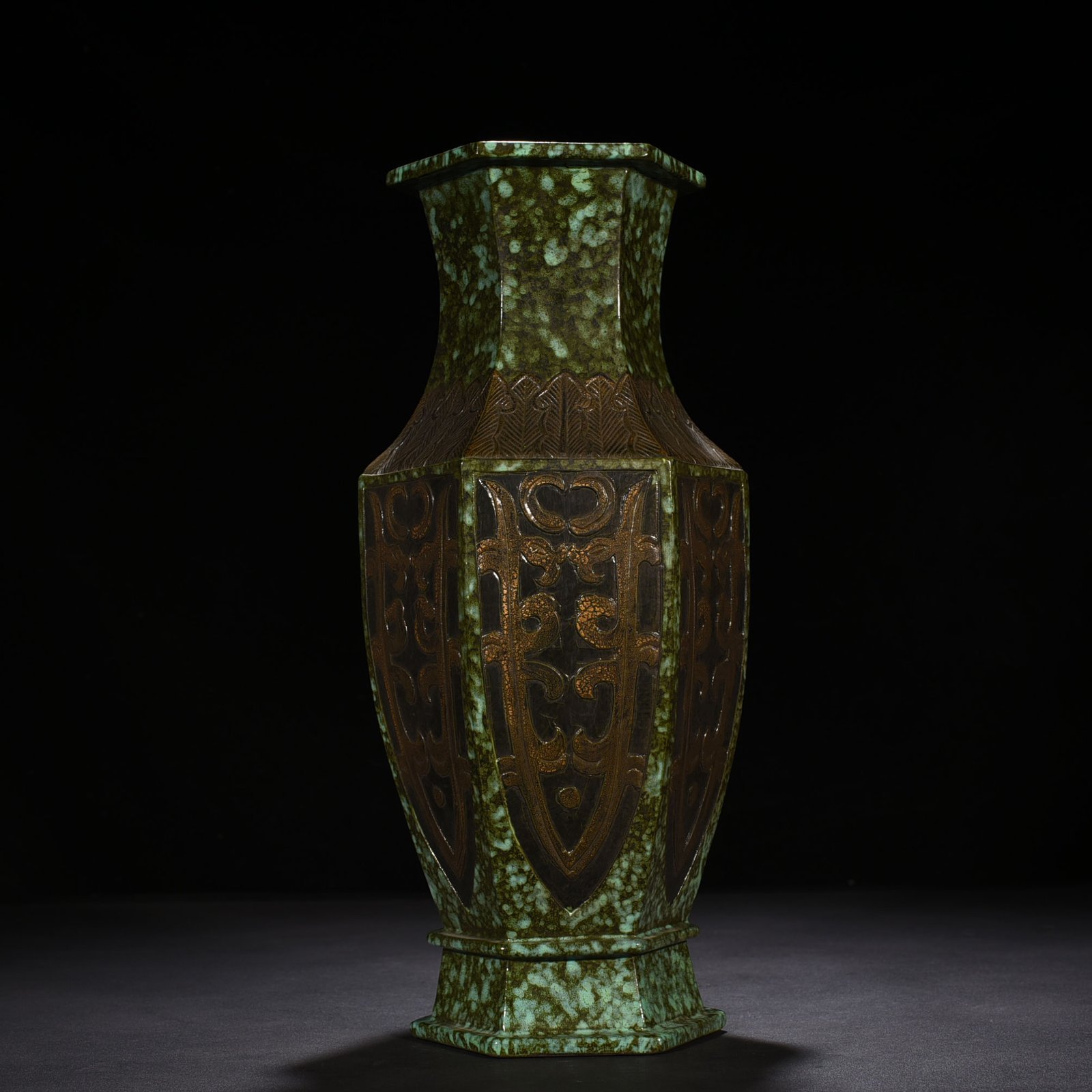 Qing Dynasty Qianlong bronze glaze hexagonal vase with carved chilong pattern